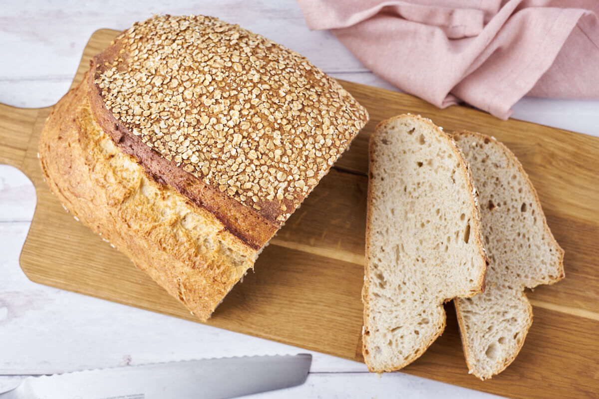 Delicious homemade cold proofed oat bread ready for serving on a tapas board