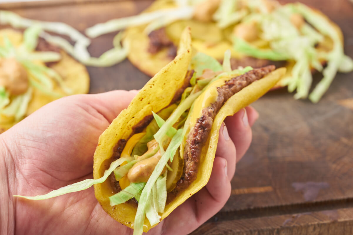 taco burger with lettuce, cheddar and big mac dressing