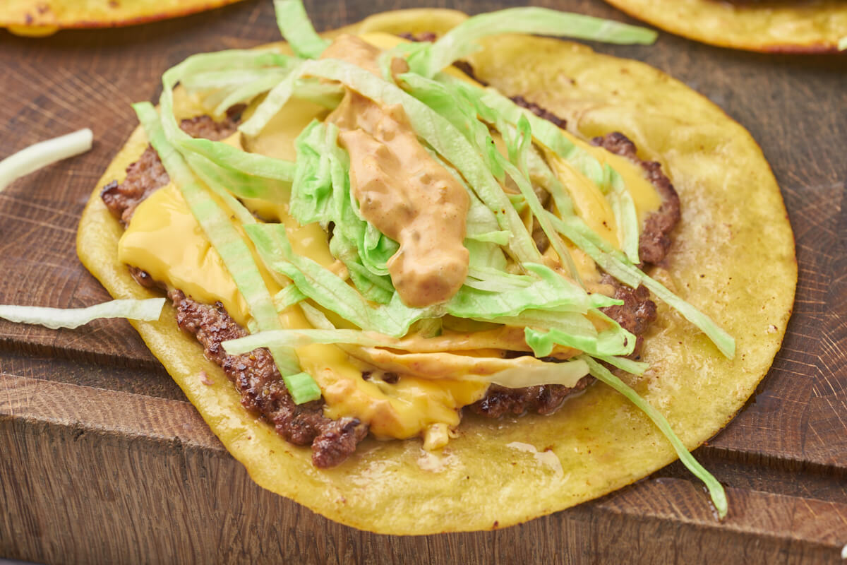 soft taco with beef, cheddar, cucumbers, lettuce and burger dressing