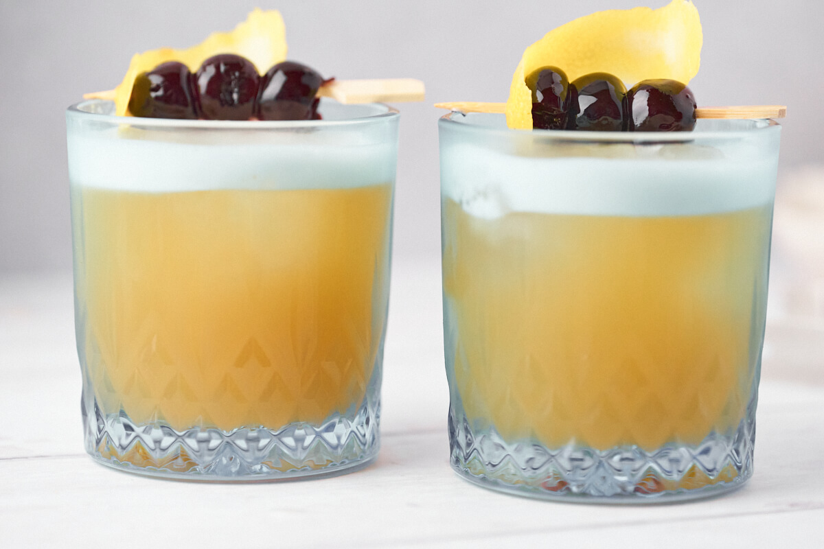 Two glasses of Amaretto Sour