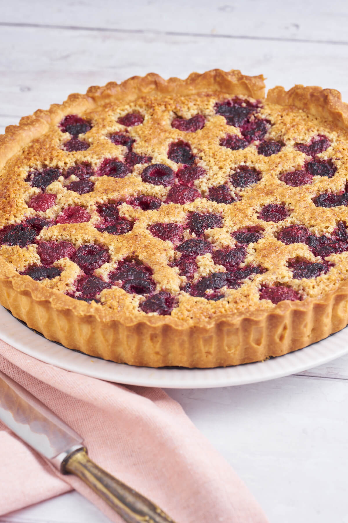 homemade raspberry tart with frangipane