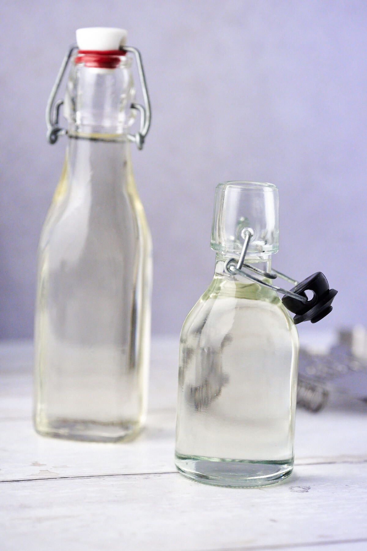 Bottles of homemade simple syrup for drinks