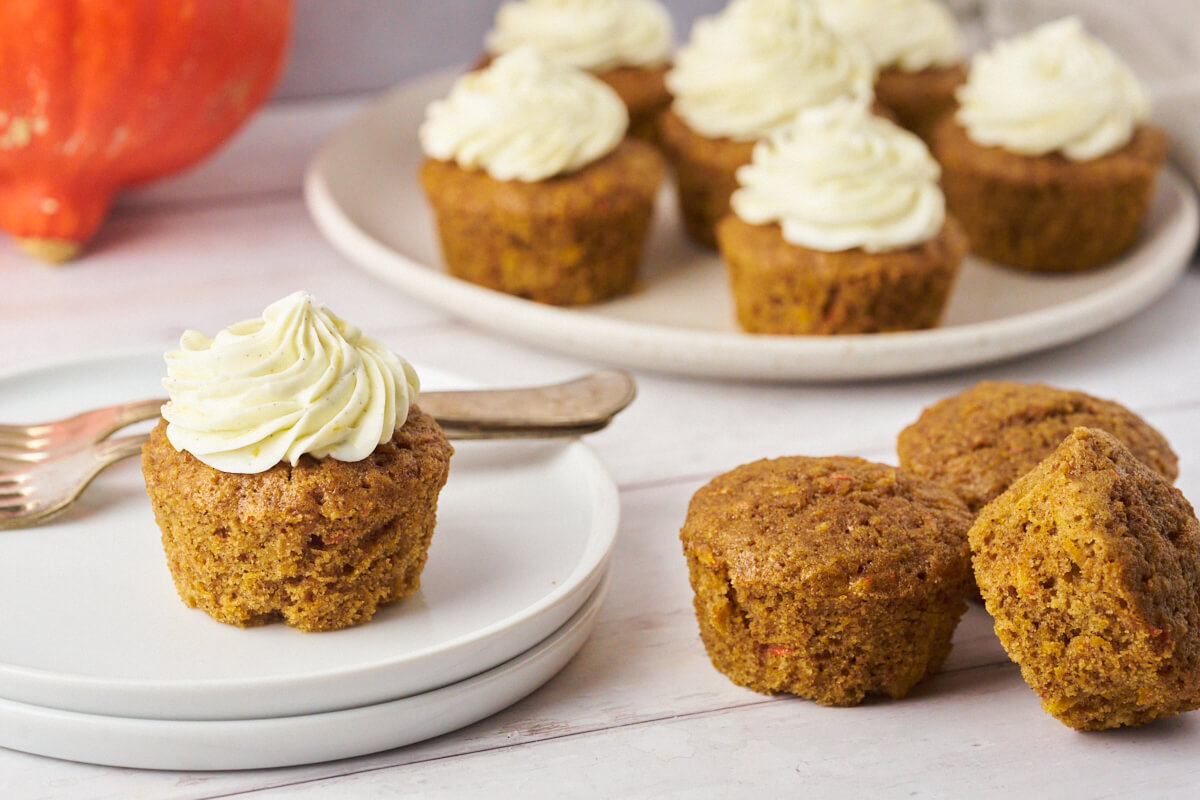 Delicious moist pumpkin muffins with cream cheese frosting on top