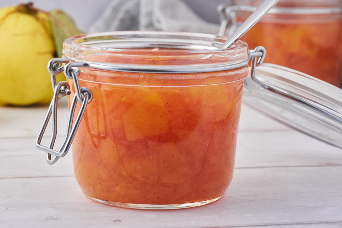 jar with quince jam where you can see the pieces of quince.