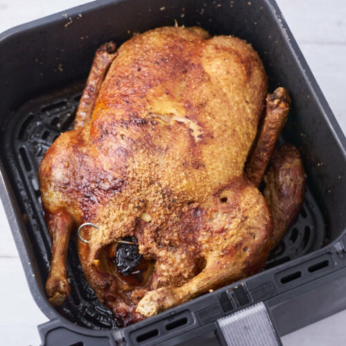 Air Fryer Duck in basket from Cosori Dualblaze Air Fryer.