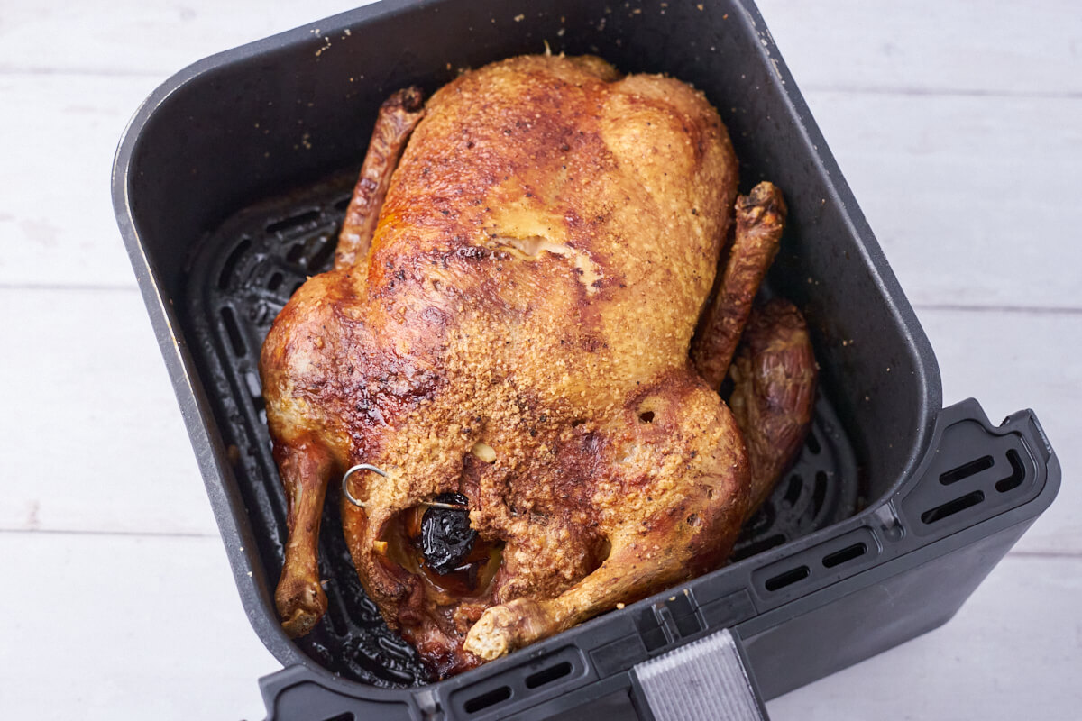 Air Fryer Duck in basket from Cosori Dualblaze Air Fryer.